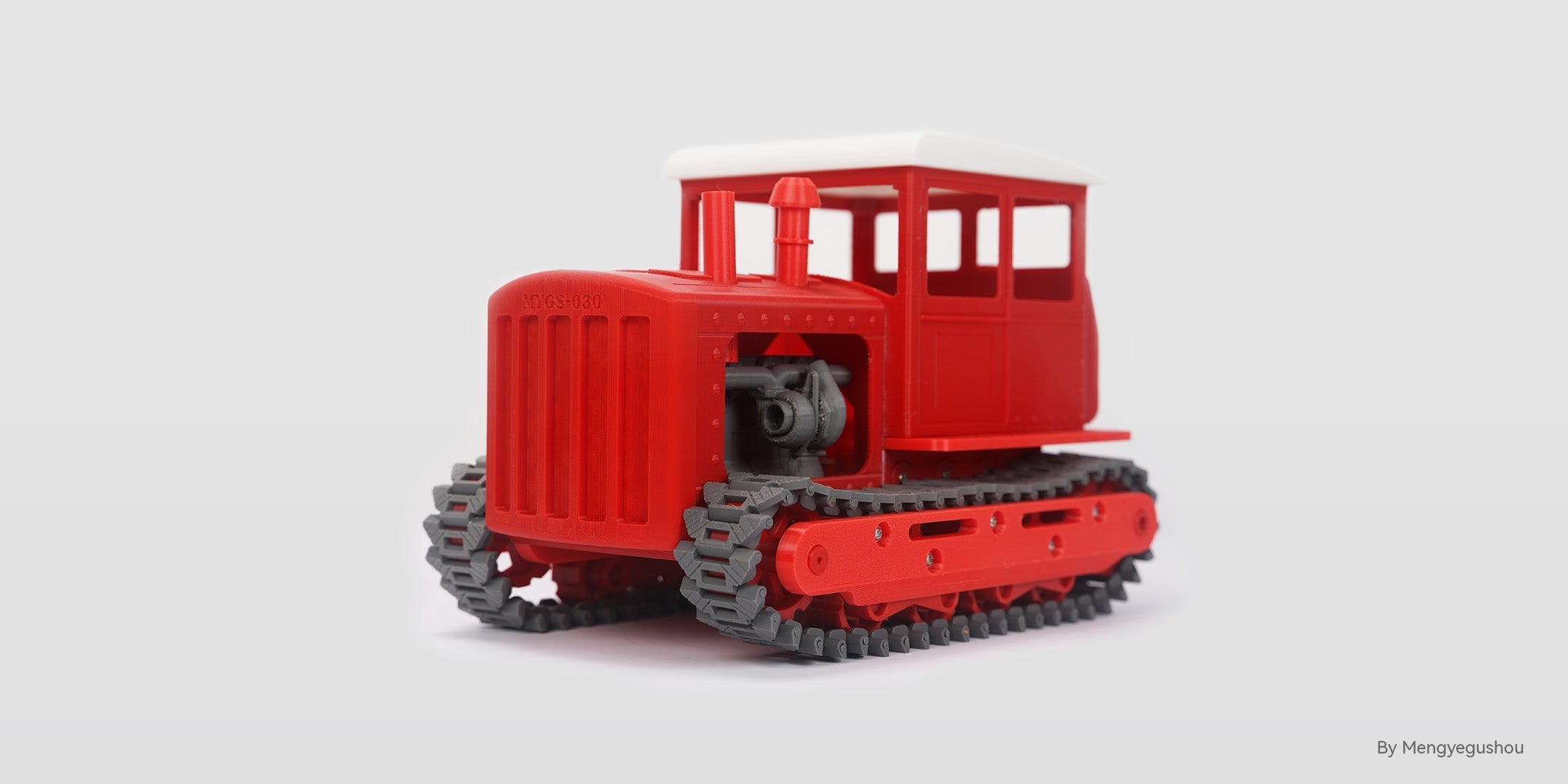 Flashforge 3D printed red tractor model showcasing rapid high-temperature printing capability