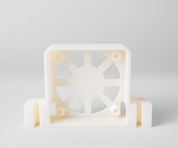 Flashforge 3D printed white fan mount, demonstrating rapid high-temperature printing capability